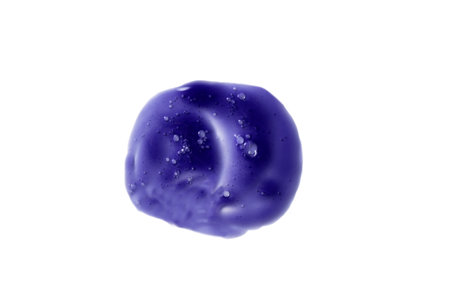 Purple blonde dye hair shampoo smear isolated on white background. Texture of purple hair tonic for blond hair.の写真素材