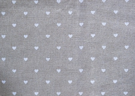 grey cotton napkin with hearts. decorated background for valentines dayの写真素材