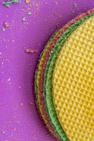 Colourfull waffles. Textured abstract background. Close up. Flat layの写真素材