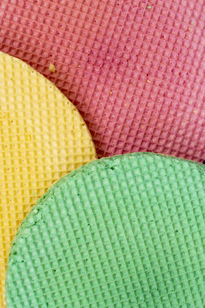 Colourfull waffles. Textured abstract background. Close up. Flat layの写真素材