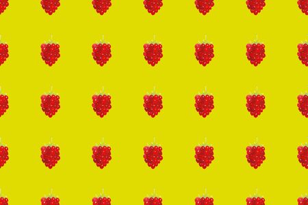 Watercolor seamless pattern with red raspberries on yellow background. Hand drawn fruit vegetarian pattern for textile, wallpaper, paper, menu decoration and designの写真素材