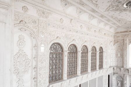 Kashan, Iran, Novemver 10.2016: The balcony decoration of the Tabatabaei House built by a persian architect Ustad Ali Maryam. Radiant beauty of ornaments and reliefs of stucco inside a balconyのeditorial素材