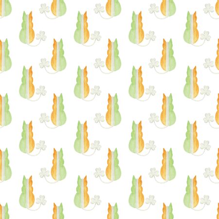 Seamless pattern with a cat in irish flag colors. A cat with shamrock on its tail. Hand-drawn watercolor illustration. Funny background for St. Patrick's Day celebration and design with Irish symbolsの写真素材