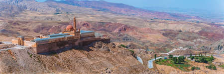 Dogubayazit, Turkey, 08.25.2014: Panorama of Ishak Pasha Palace and mountains around. Beautiful mountain landscape. Middle East architecture.のeditorial素材