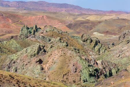 Mountain landscape in the vicinity of Dogubayazit, Eastern Turkey, Agri Province. Multi-colored rocks on the background of blue sky. Typical landscapeの写真素材