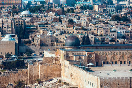Jerusalem, Israel, 01.03.2018: Panoramic view of Jerusalem and The Temple Mount. The Al Aqsa Mosque, houses, walls. Cityscape from the Mount of Olives in sunny weatherのeditorial素材