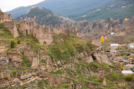 Old stone town Kakhib, Dagestan, Russia. Ancient towers, ruins and houses on the rocks. Panoramic view of the city on the mountainsの写真素材