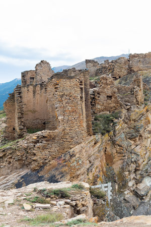 Panoramic view of the ancient Goor village, Dagestan, Russia. Ancient houses on the rocks. Ruins of the abandoned village.の写真素材
