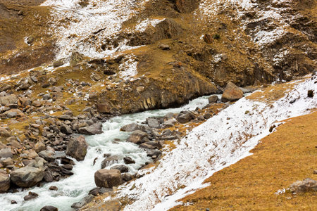 Beautiful panoramic view of the gorge. autumn mountain landscape. Oysor river in Dagestan, Russia. Valley in Chirkhalyu or Chvakhilo waterfalls. Majestic mountain peaks.の写真素材