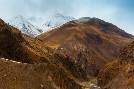 Beautiful panoramic view of the gorge. autumn mountain landscape. Oysor river in Dagestan, Russia. Valley in Chirkhalyu or Chvakhilo waterfalls. Majestic mountain peaks.の写真素材