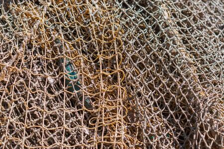 Old fishing nets. Abstarct background of nets, geometric pattern.の写真素材