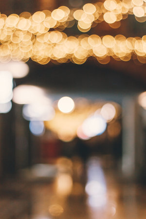 Blurred street with Christmas bokeh.の写真素材