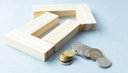 Close up of coins to stack of coins, Business Growth concept, There is money coins to stack of coins. Financial risk.の写真素材