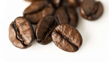Half roasted coffee, isolated on white background.の写真素材