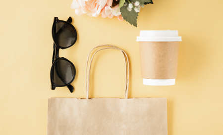 Online shopping concept, Three colorful paper shopping bags on notebook keyboard. E-commerce is the purchase of products and servi.の写真素材