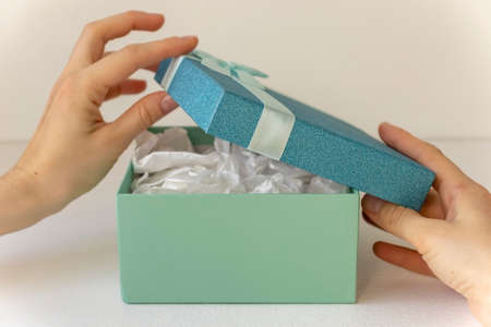 Gift boxes with ribbons and on a white background.の写真素材