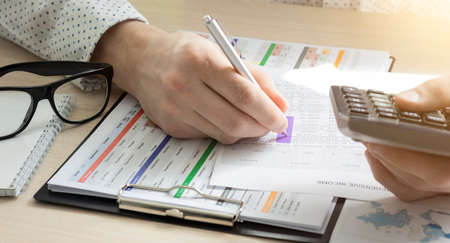 Financial trading chart double exposure with man desktop background.の写真素材