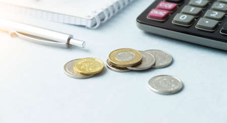 White calendar with Taiwan coin in planning travel concept.の写真素材
