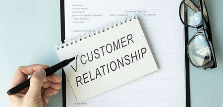 business hand writing customer relationship management conceptの写真素材