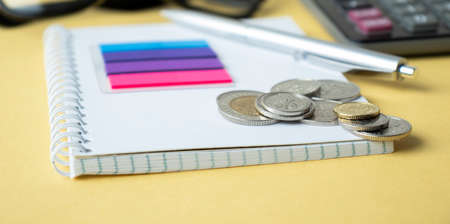 White calendar with Taiwan coin in planning travel concept.の写真素材