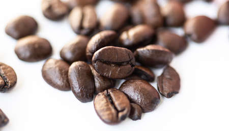Half roasted coffee, isolated on white background.の写真素材