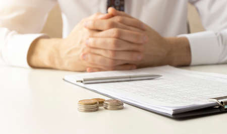Man hands with bills and money. Concept finance.の写真素材
