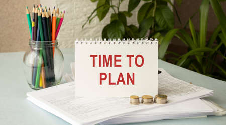 Text TIME TO PLAN .Planning concept with telephon and office toolsの写真素材
