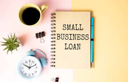 Handwriting of Small Business Loan on working tableの写真素材