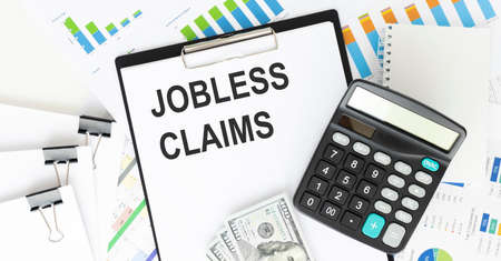 Unemployment claim form on white background top view copy spaceの写真素材