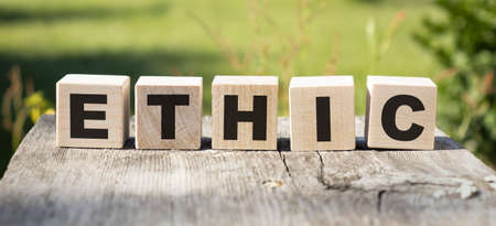 Text ethic on cubes, moral obligations conceptの写真素材