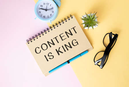 Retro effect and toned image of notebook next to a fountain pen. Business concept image with...