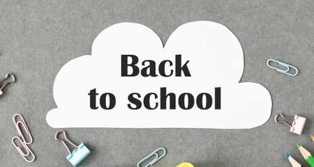 Crayons and back to school text over white backgroundの写真素材
