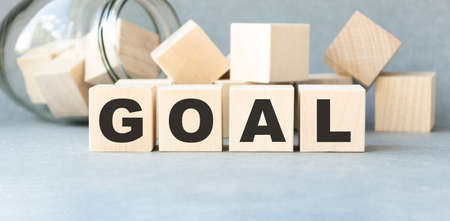 GOALS text on wooden cubes with winning cupsの写真素材