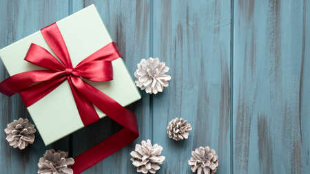 Top view two gift boxes on a blue wooden background in vintage style with copy spaceの写真素材
