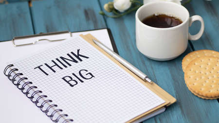 Businessman Writing the Words Think Big, business concept.の写真素材