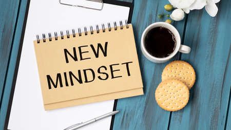 Conceptual handwriting showing New Mindset written on Notebook Book on plain background.の写真素材