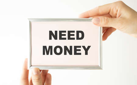 woman with paper blank sheet. Need money poster, debt and loan conceptの写真素材