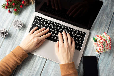 laptop and phone with empty screen for christmas seasonal advertisingの写真素材