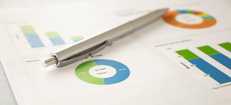 pen and financial documents on the table of the businessmanの写真素材