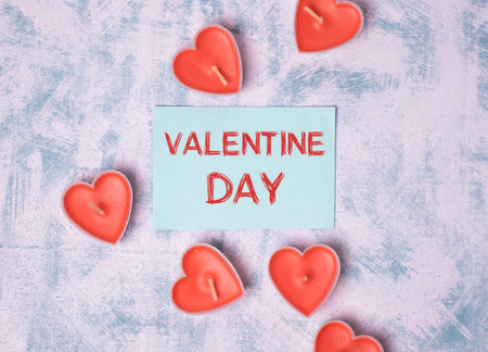 Valentines day message on paper with pink heartsの写真素材