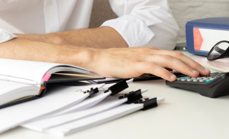 Concept of adult bearded businessman searching a great business solutions in modern workplace.Screen...