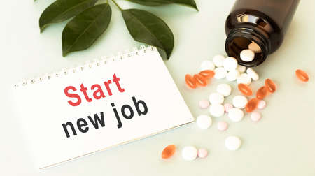 Text new jobs on notepad. Medicine concept, change of activityの写真素材