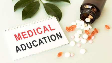 The inscription MEDICACAL ADUCATION on a notebook. Medicine conceptの写真素材