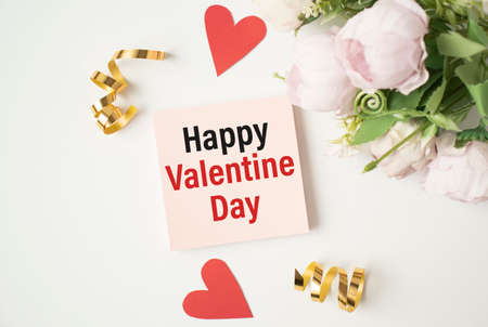 Beautiful romantic background with decorative hearts, text Happy Valentine Day on card.の写真素材