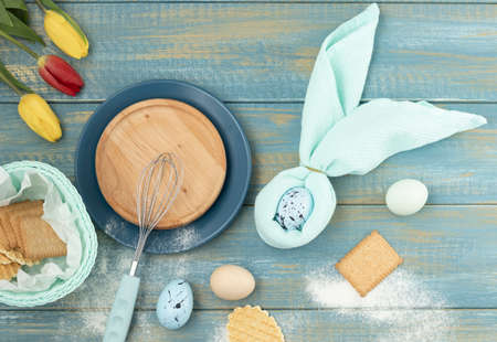 Beautiful festive Easter table setting with napkin Easter Bunnyの写真素材