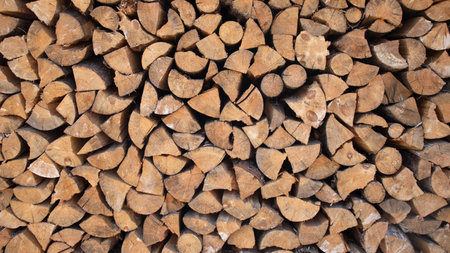 wall firewood, Background of dry chopped firewood logs in a pile.