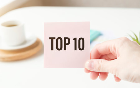 Text Top 10 Ten List. Business concept for Success ten list written on sticky note paper on the...