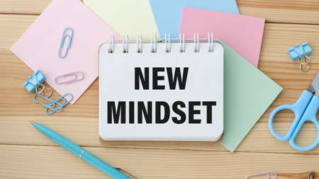 New Mindset - New Results text on sticky notes isolated on office deskの写真素材