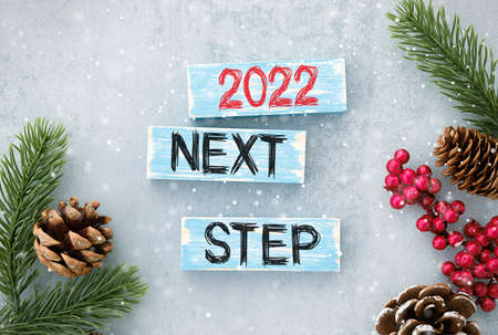 2022 next step text on light box on desk table in home office. Business motivation or inspiration, performanceの写真素材