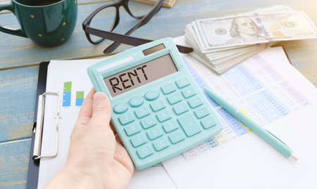 Calculator with the word RENT on the displayの写真素材